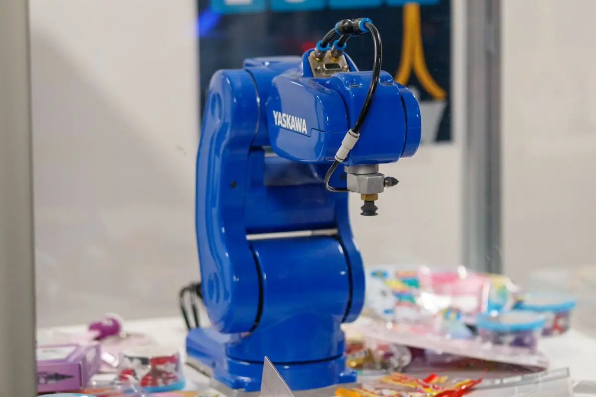 An industrial robotic arm operating on a production line